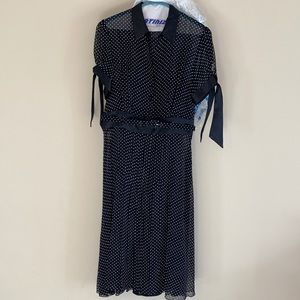 Adorable polka dot sheer/lined cocktail dress.